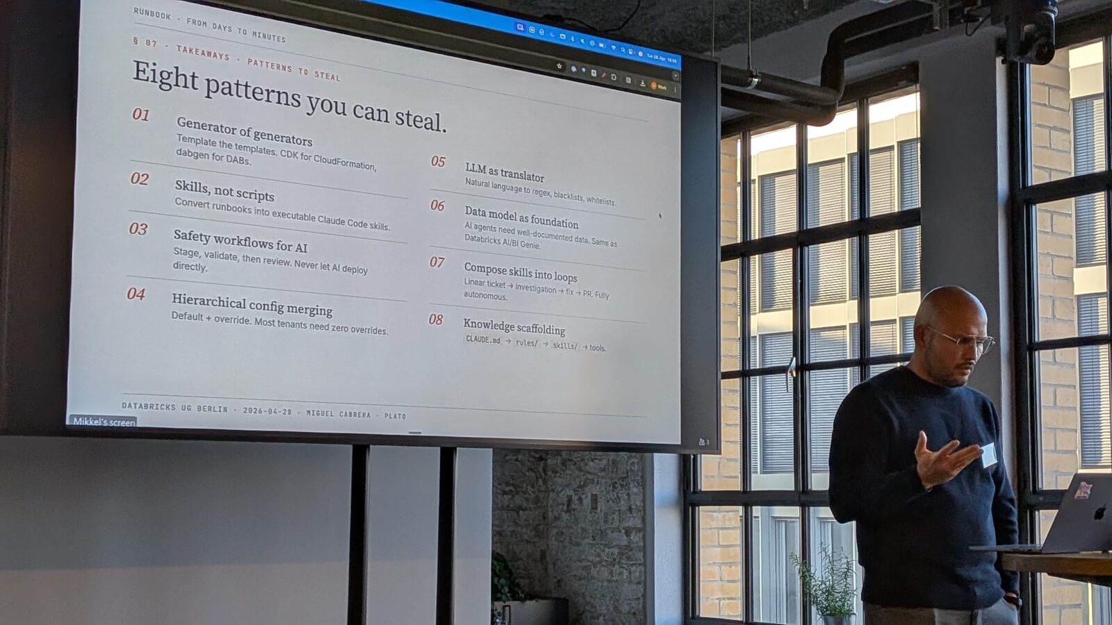 Miguel presenting the "Eight patterns you can steal" takeaway slide at the Databricks Berlin User Group, April 28 2026.